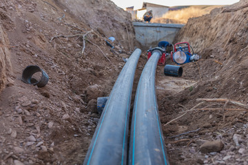 sewer pipes with water are laid underground