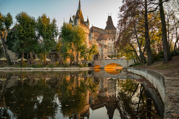 Hungary Budapest 2018: Vajdahunyad castle reflection on Városliget lake in Budapest autumn