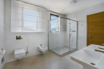 Naklejka na ściany i meble Interior of a spacious bathroom in a luxury villa