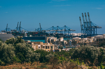 Fototapeta premium Cranes in the port, Malta Freeport, Birzebbuga