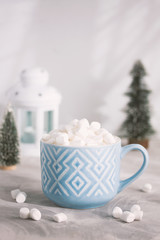 Christmas and Happy New Year mug of cacao with marshmallows