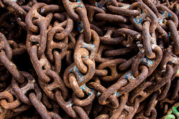 Old rusted  chains with cracked paint