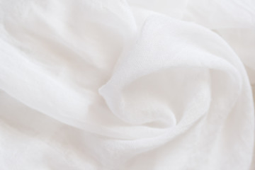White wrinkled old viscose silk. Thin tissue. random air folds. Viscose silk fabric texture...