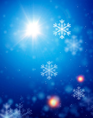 Fototapeta na wymiar Blue sparkling background with stars. Blue bokeh background with snowflakes. Empty winter background, snowy, celebratory.