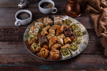 Oriental Baklava and delights on silver tray with coffee