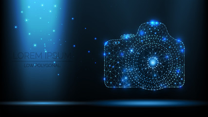 Abstract vector wireframe SLR photo camera. 3d modern illustration on dark blue background. Low polygonal mesh art looks like constellation night sky with dots and stars. bright light from particles © Ra
