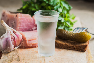 A glass of vodka on the table