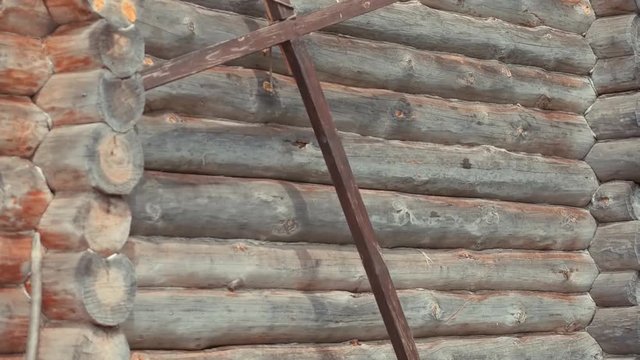 An ancient Slavic pagan city built of wood, excellent scenery for a historical film, old wooden churches and houses, an orthodox cross, summer time, no people in the frame, old Kiev