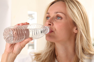 WOMAN DRINKING WATER