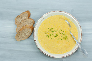 Sweet and creamy corn soup with cress.