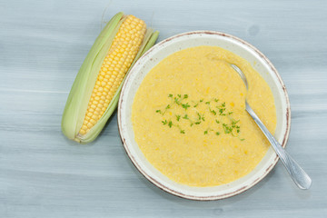 Sweet and creamy corn soup with cress.