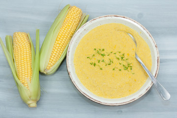 Sweet and creamy corn soup with cress.