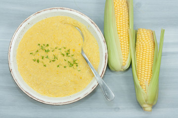 Sweet and creamy corn soup with cress.