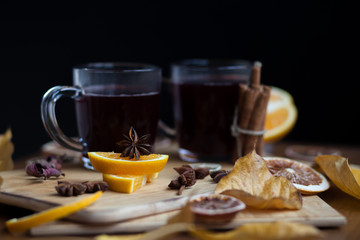Delicious Christmas mulled wine with orange, lemon zest, cinnamon and anise