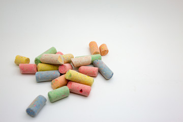 colorful crayons on white background