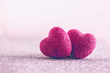 Fototapeta premium Red heart on a silver background. Heart of marmalade. Candy heart. Background to the day of lovers, background of love