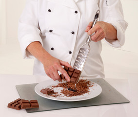 CHEF GRATING CHOCOLATE