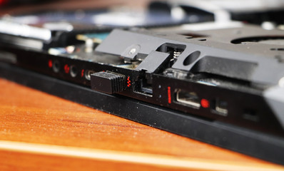 Closeup of usb connector in laptop. Inside the connector is a flash drive