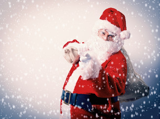 Funny Santa Claus with sack on white background