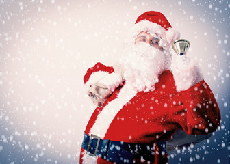Funny Santa Claus with sack on white background