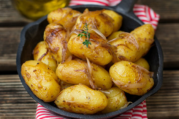 Roasted baby potatoes with onions caramelized in soy sauce
