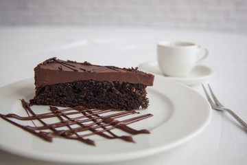 chocolate cake with cup of coffee