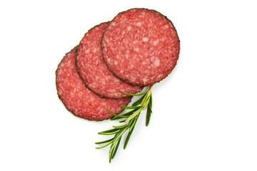 Italian salami Traditional smoked slices with herbs, isolated on a white background. Top view.