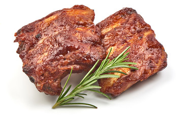Grilled Ribs with Barbecue Sauce with herbs, isolated on a white background. Close-up