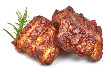 Barbecued and Marinated Sticky Spare Ribs with herbs, isolated on a white background. Close-up