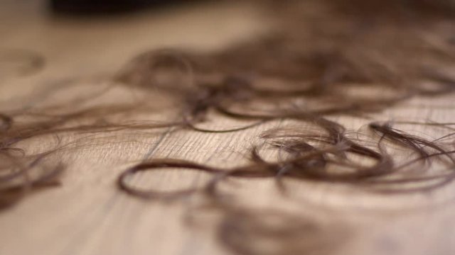 Floor Full of cut hair.