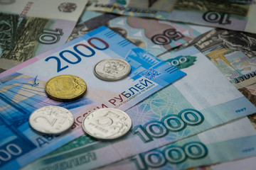 various russian banknotes and coins. paper and metal money for background and illustration