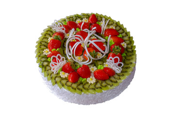 cream cake decorated with kiwi slices and strawberries