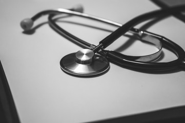 Stethoscope on paper tablet