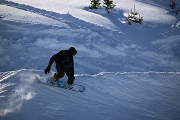 Amateur Snowboarder on Slope