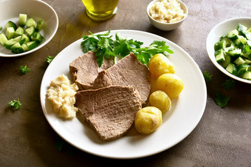 Boiled beef with potatoes and horseradish