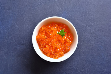 Red caviar in bowl