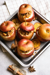 Baked apples with granola, cinnamon, nuts