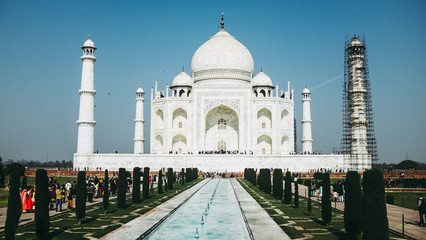 Fototapeta na wymiar The Taj Mahal in Agra, India with scaffolding on one pillar