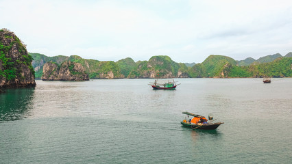 Fototapeta na wymiar Traditional fishing boats in Ha Long Bay, Vietnam