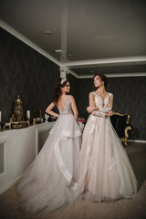 Naklejka premium Beautiful model in a modern wedding dress.