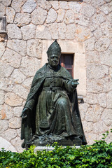 Fototapeta na wymiar Mallorca, Spain - July 19, 2013: Monument to Bishop Pere Joan Campins, one of the patrons of the monastery