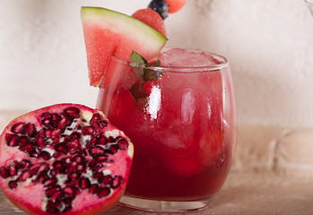 watermelon cocktail with lemon and pomegranate