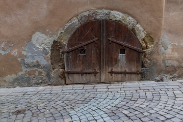 Rustic old wooden double door to cellar, Germany, Europe