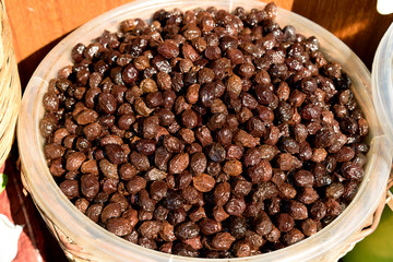 Bucket of black olives.
