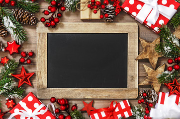 Christmas decoration chalkboard gift box stars red ornaments dark