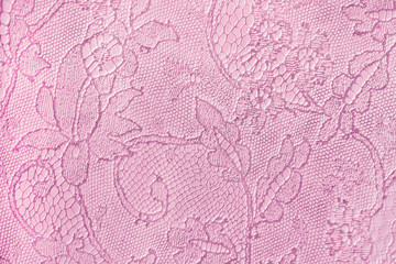 Texture of tender pink genuine leather close-up, with embossed floral trend pattern, wallpaper or banner design