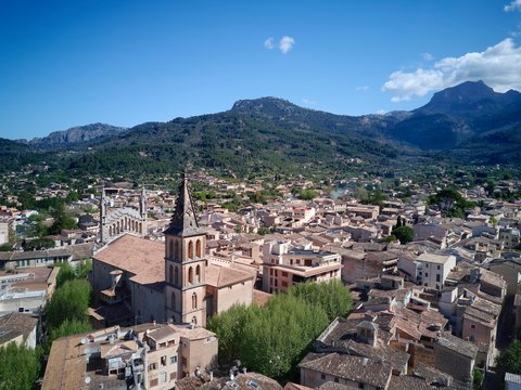 View of the old town with church of St. Bartholomew, Roman Catholic parish church, Soller, mountains at the back, Serra de Tramuntana, Majorca, Balearic Islands, Spain, Europe