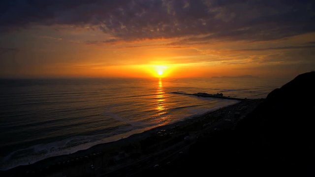 Golden seascape sunset over the Miraflores Latin American coastal beach Region of Lima Peru South America 