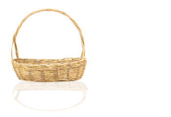 Empty wicker basket isolated on white background