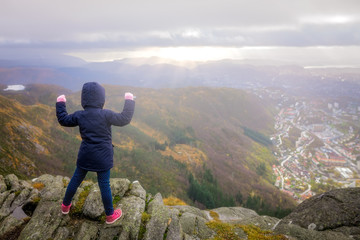 Young girl on top of the Mount Ulriken